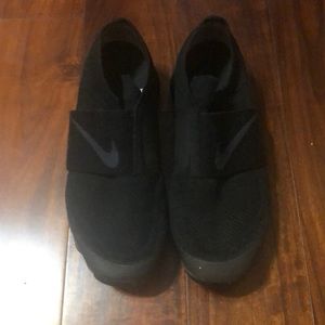 Size 11 Nike vapormax slip on shoes.
